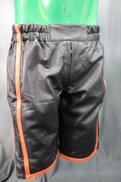 Basketball Shorts in Black and Orange - front view