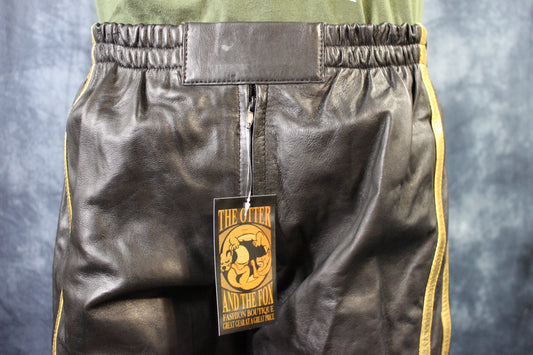 Basketball Shorts in Black and Gold - front view