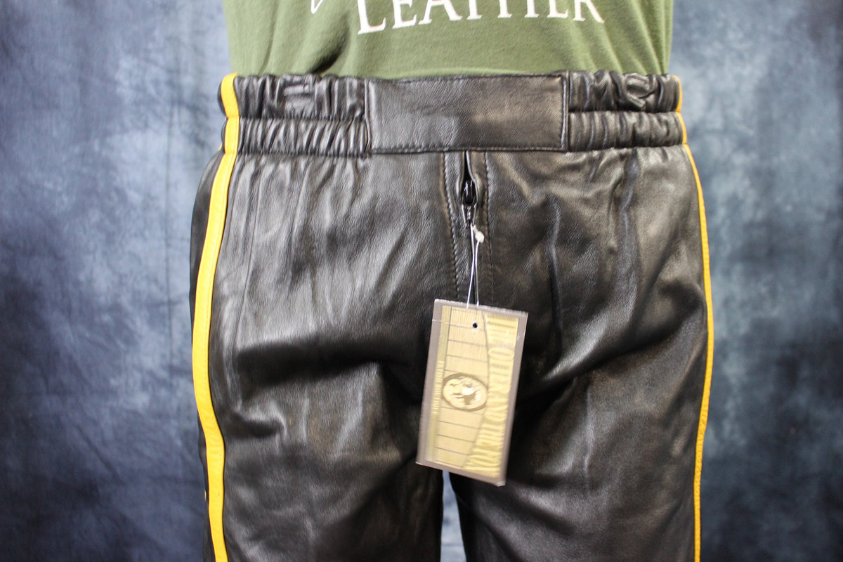 Basketball Shorts in Black and Mustard Yellow - front view
