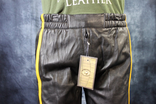 Basketball Shorts in Black and Mustard Yellow - front view