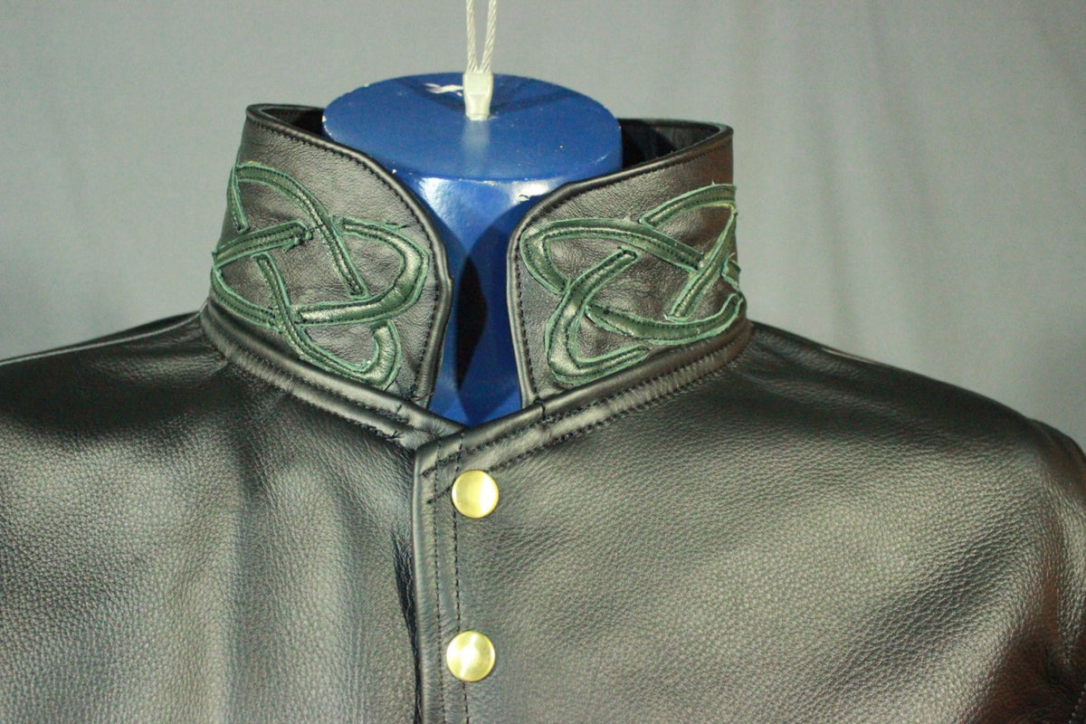 Leather dress coat with celtic highlights in forrest green. - front view